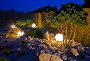outdoor landscaping with spherical garden lights